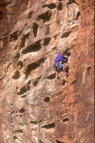 Tony Sartin climbing in the Calico Hills.