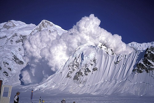 A massive 5,000-foot avalanche off Mt. Hunter consumes a smaller peak ...