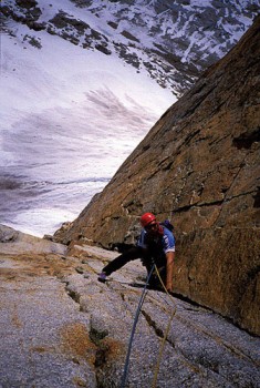 Joe Puryear following splitter granite on the Stump in the Ruth Gorge.