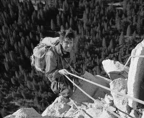 Warren Harding rappelling from Dolt Tower during the first ascent of T...