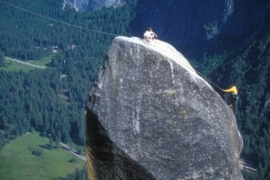 Topping out on the Lost Arrow Spire Tip. The rope on the left leads to...