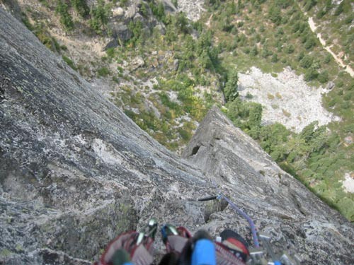 Looking down at the third pitch.