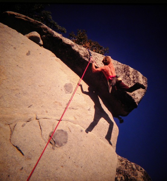 Ron Carson swings out on one of Dome Rocks classic Top Ropes