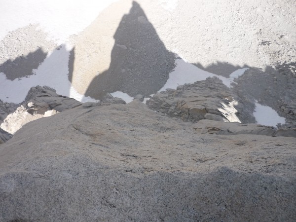 looking down the N. Buttress from the ledge on top of the crux pitch.