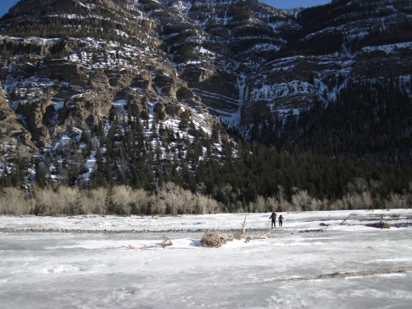Matt and Nathan crossing the well frozen South Fork of the Shoshone Ri...