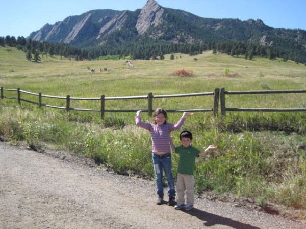 My kids holding up the Flatirons, Boulder, CO. &#40;I think they need ...