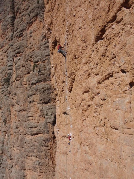 Approaching the first crux, a small overlap. Some Spanish climbers on ...