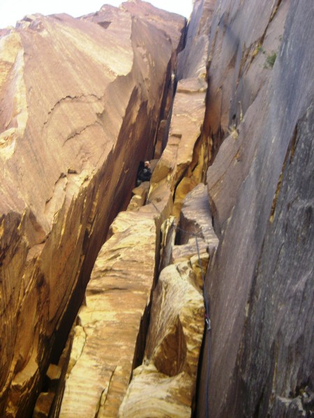 Looking up the first chimney pitch.