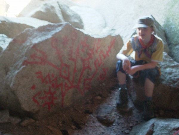 Inspecting some of the alien graffiti. Pass the tinfoil dad.....