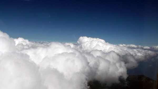 Cruising past the buildups at around 14,000 feet.