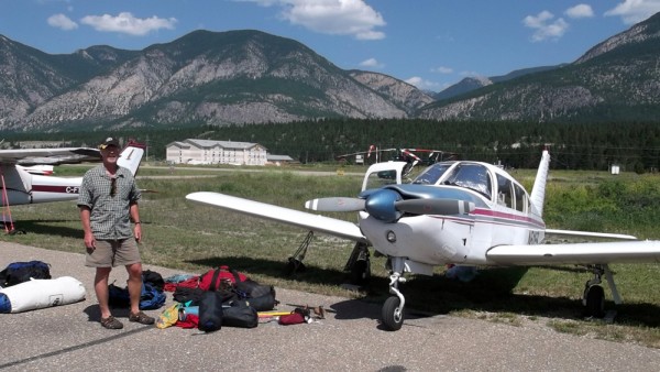 Sierra tied down on the ramp at Invermere, sorting our gear and packin...