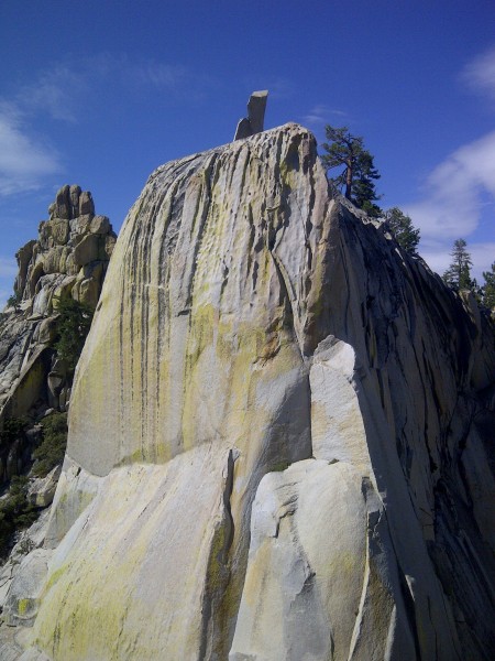 Spooky follows the corner to the ledge- the variation climbs the arete...