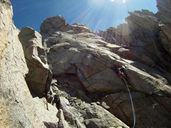 Charlie heads up towards the summit plateau of Tbolt