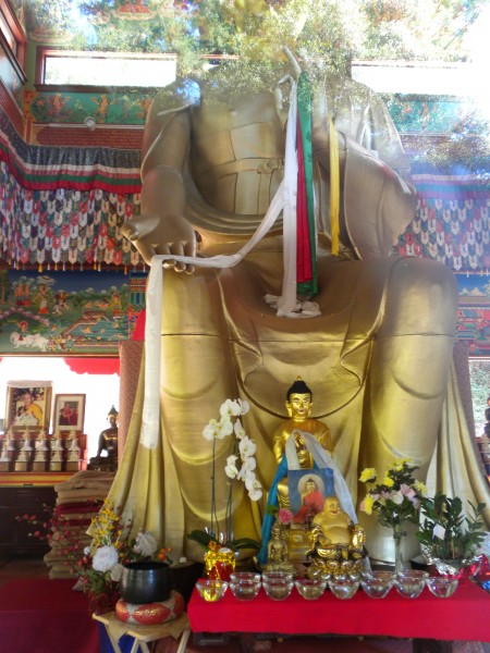 Inside the Temple is a beautiful golden Buddha about 40 feet tall.  Un...