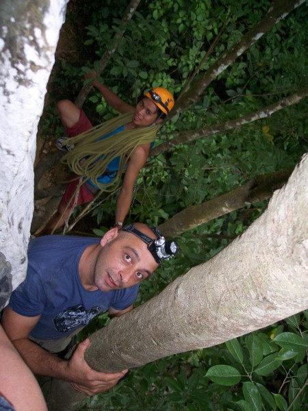 Raymund retrieving the rope we used to belay the girls into the cave. ...