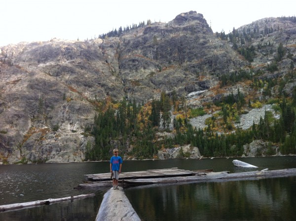 There is a cabin at the lake.  Someone had build a small dock that was...