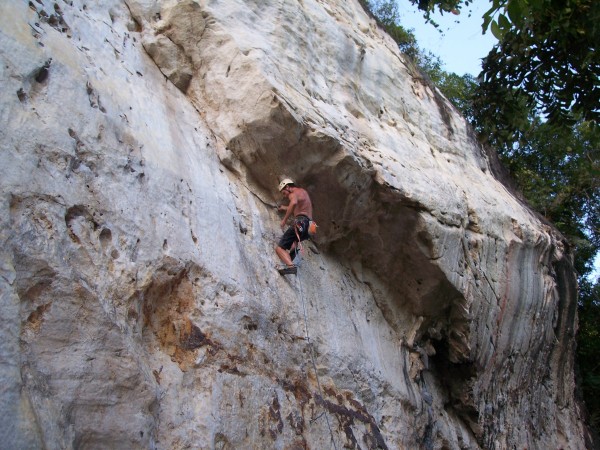 in position to clip the roof bolt...