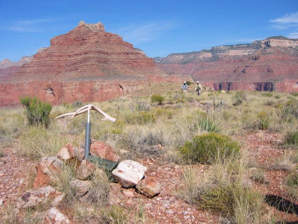 The summit cairn and ammo box with Isis in the background