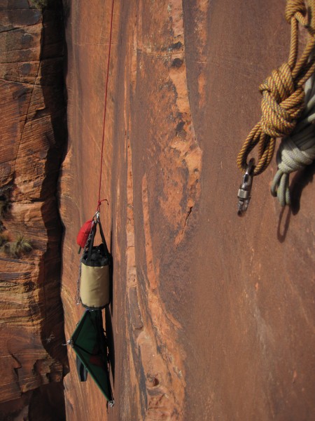 Lowering out the bag from pitch 6 anchor