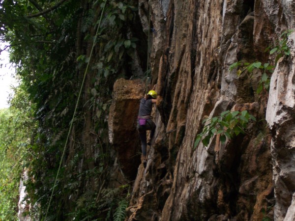 Another teenage girl climbing "Balite" 5.7 the route is super vertical...