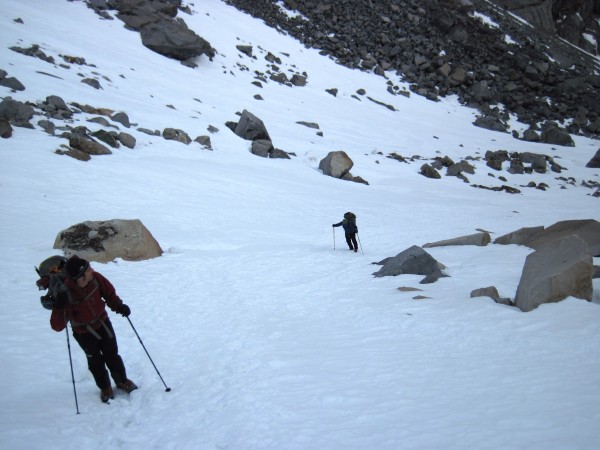 Vito and Sean hiking up canyon on pretty well filled-in and fairly pac...