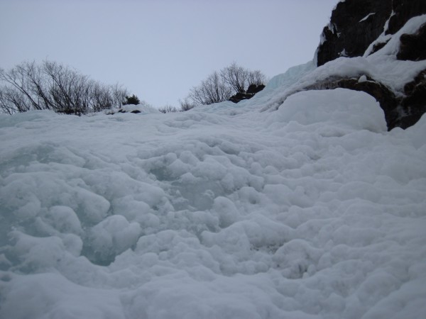 Water was splashing down the ice at the left side of the cave where I ...