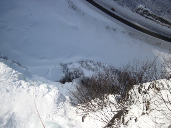 Looking down as I rappelled - the yellow truck far below is Harry's.