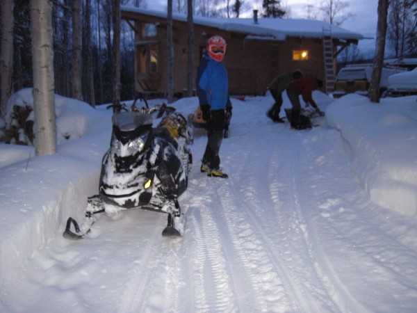 Back at Harry's cabin to put snow mobiles back onto trailers, pack up ...