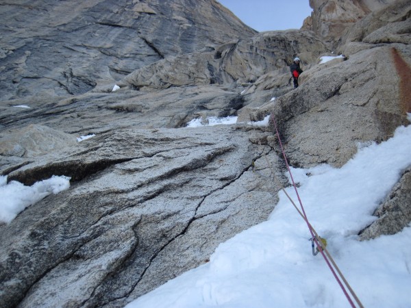 Steve at the 1st belay above the steep snow and the rock crux. Pro for...