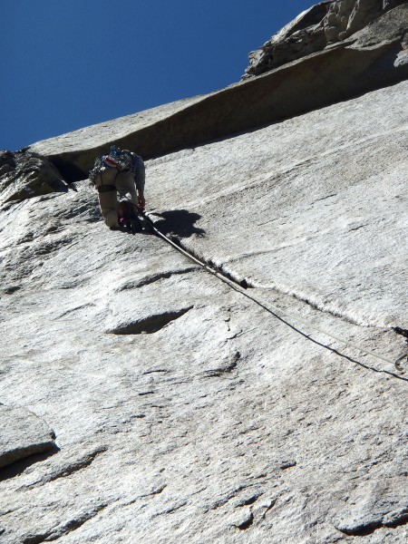 Tom climbing the beautiful second pitch.  It goes from a seem at the s...