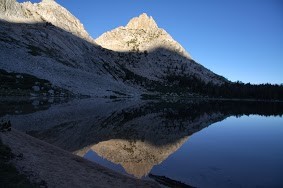 Dawn hits ragged peak.