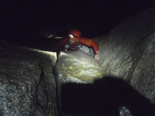 climbing the 5.6 crack on Mendel, pre-dawn