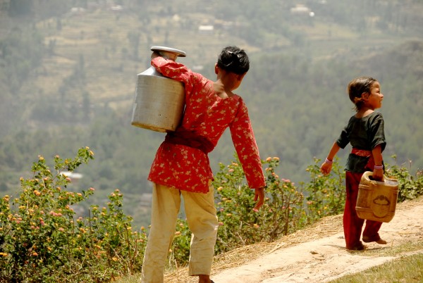 Dunuwar girls returning from getting water.  Man that would get old.  ...