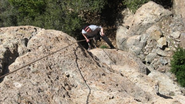 Chris Summit fixing the smashed lead bolts/hangers on Feelin Your Oats...