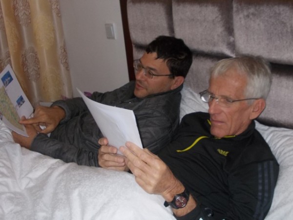 Phil and I planning the trip in his Beijing apartment...Angela was sho...