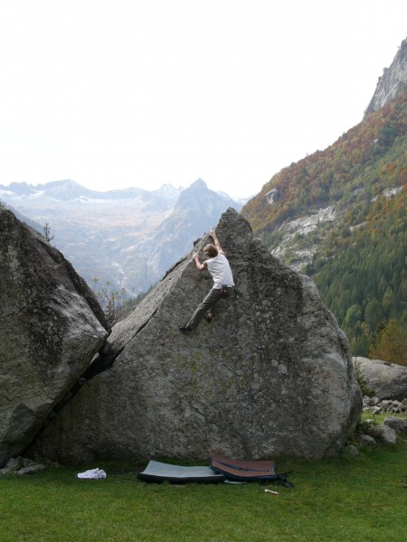 Bob Smith climbing. These boulders litter the valley floor.