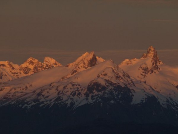 Did the first ascents of the two peaks on the right.