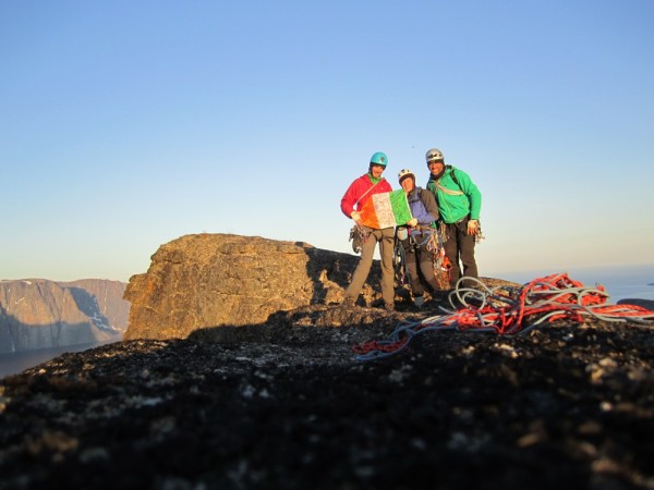 Summit photo, we were too tired to realise that we were holding the Ir...