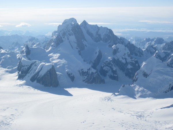 A tele-shot of the Moose's Tooth massif from the west on Peak 11,300 &...