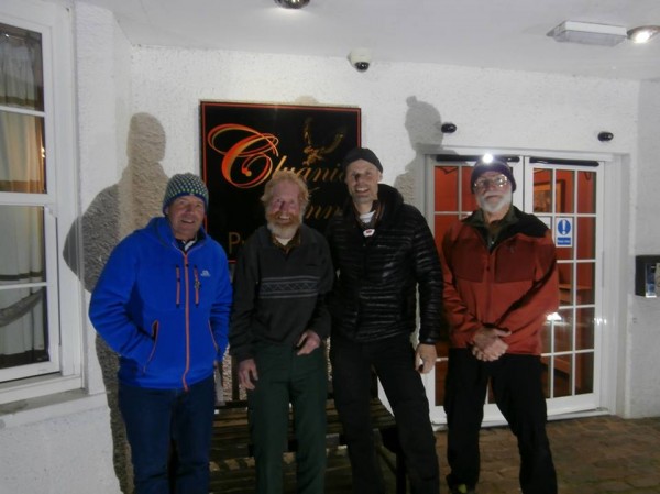 Dave snapped this pic of Sandy, Andy, Steve, and me outside the Cluani...