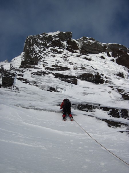 Susan heading up our route - the Sermon - steep ice and snow to the le...