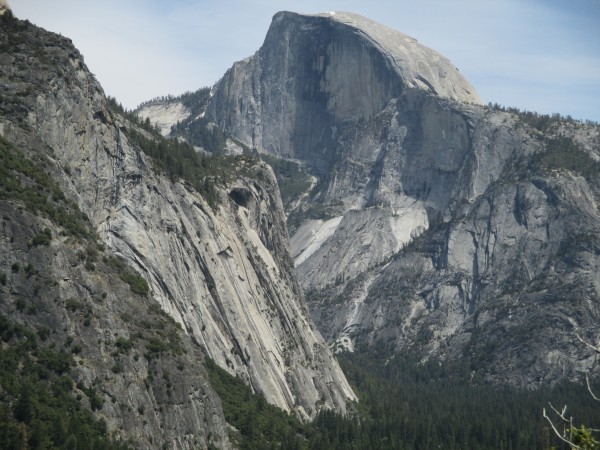 the half shell looms over a 5.6 climbers equivalent of it.