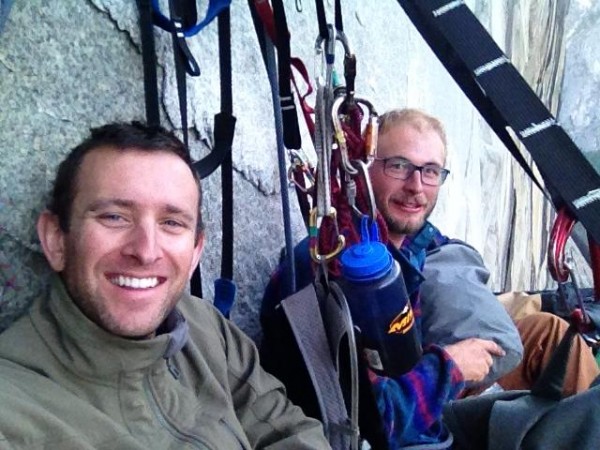 all smiles on the ledge after a full day of climbing.