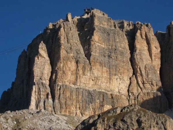 Up the pillar on the left, onto the shaded face, and into the bowels o...