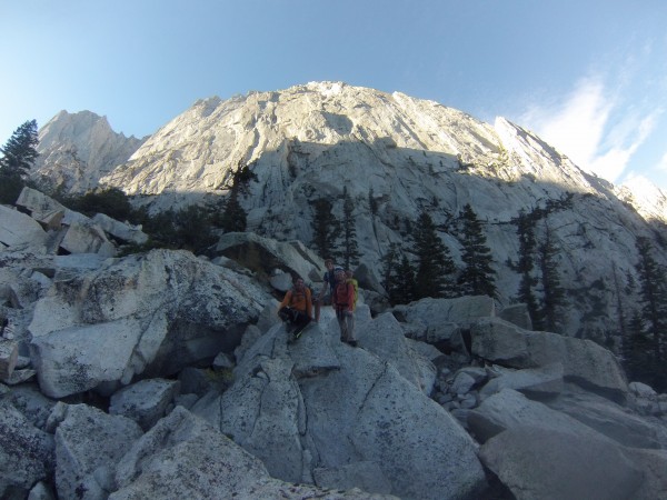 Stoked after a great climb, climb in the back ground!