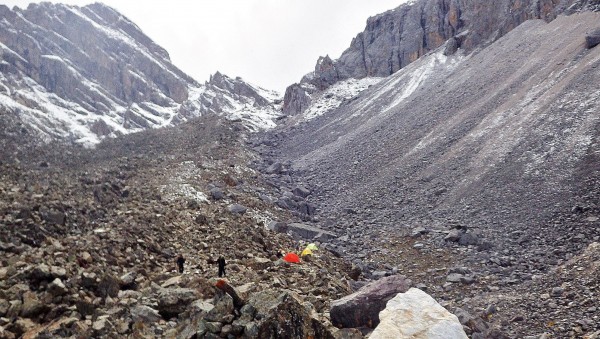 Highcamp in the cirque. Gangga VII is approached up the slope to the r...