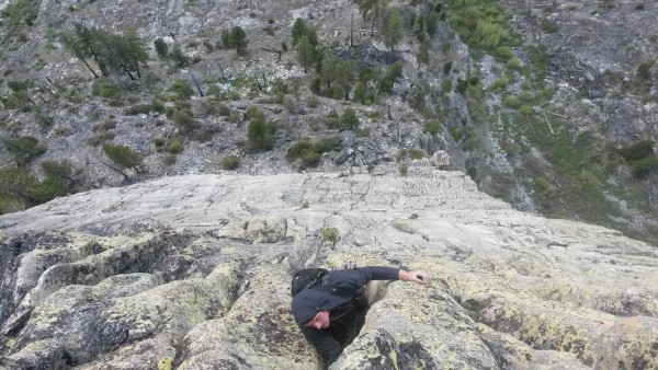 Mack topping out on Poisonflower Direct, our first climb together, 2 d...