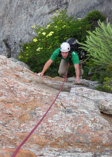 Coby heading up Garden Party after the traverse over from Garden Wall....