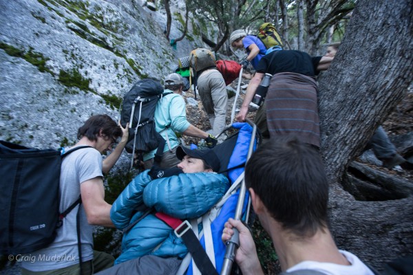 Carrying Enock through a steep section