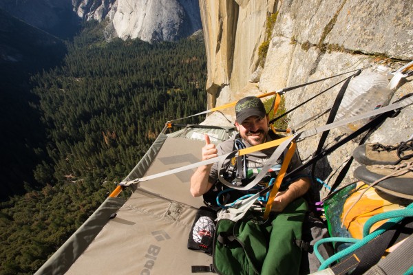 Enock's first time on a portaledge. He approves.